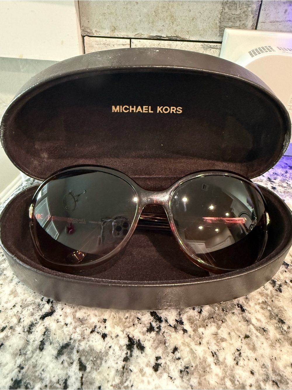 Michael Kors Large Round Sunglasses in Tortoiseshell with Dark Lenses